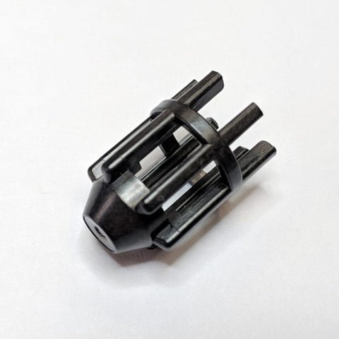 A small, complex machined PEEK part designed to replace a metal component in tactical military equipment.