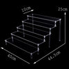 Cupcakes displayed on tiered acrylic party dessert stand for elegant serving
