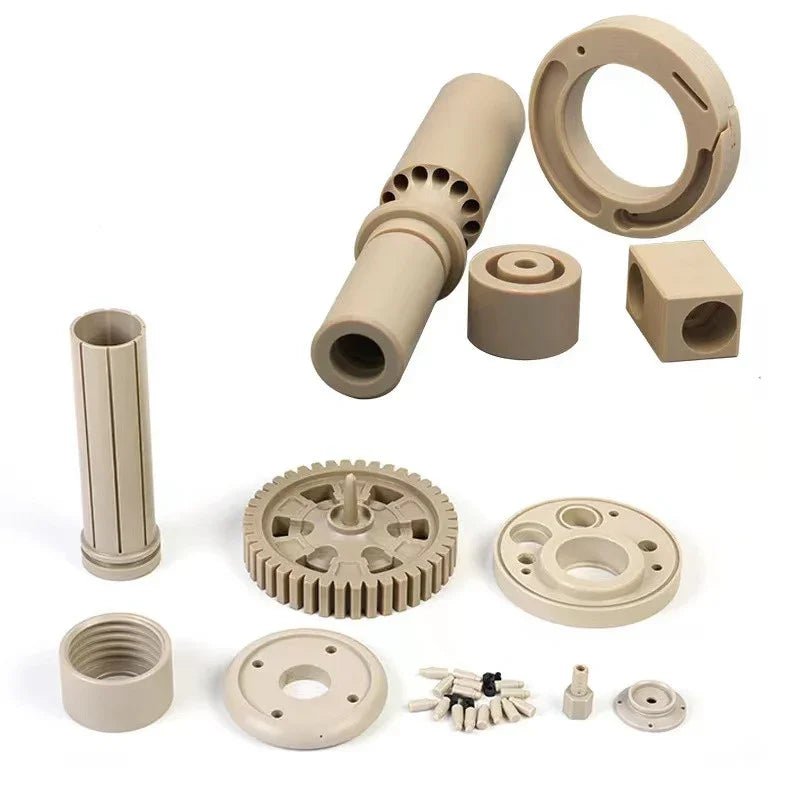 High-precision CNC-machined gears bushings and mechanical components in beige PEEK