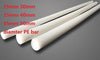 White 1 inch diameter HDPE plastic rod on a ruler